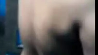 Busty Desi wife poses naked teasing with her XXX curves in MMS video